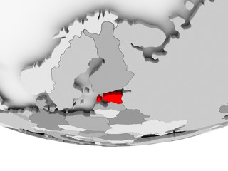 Map of Estonia on grey political globe