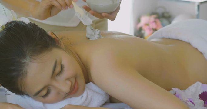 Beautiful Asian Woman Enjoying Skin Rejuvenation Treatment With Body Mask