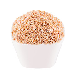 Wheat groats in white bowl, closeup, isolated. Template for menu, cover, advertising.