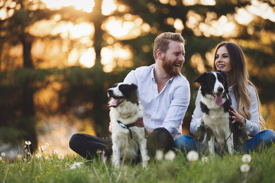 Romantic Happy Couple In Love Enjoying Their Time With Pets