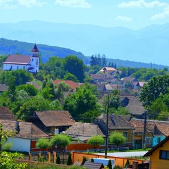 Typical rural landscape and peasant houses in Cincu, Grossschenk, Transylvania,Romania.The...