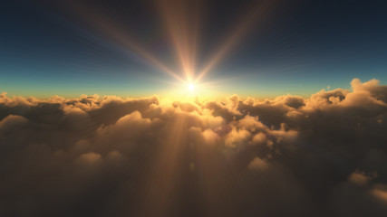 sunrise above in clouds