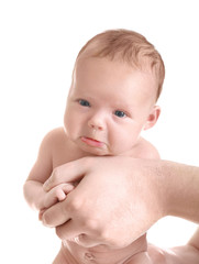 Father holding cute newborn on white background