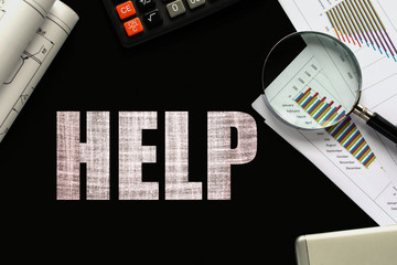 Text Help  on chalkboard with graphs, tables, calculations, calculator