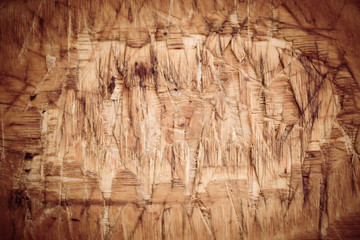 Textured aged shabby chic warm color wooden cutting board for backgrounds, brown chestnut color