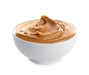 Ceramic bowl with creamy peanut butter isolated on white - Powered by Adobe