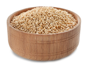 Quinoa in wooden bowl isolated on white