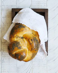 Braided bread (challah) with poppy seeds