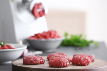 Cutlets made from forcemeat on wooden board
