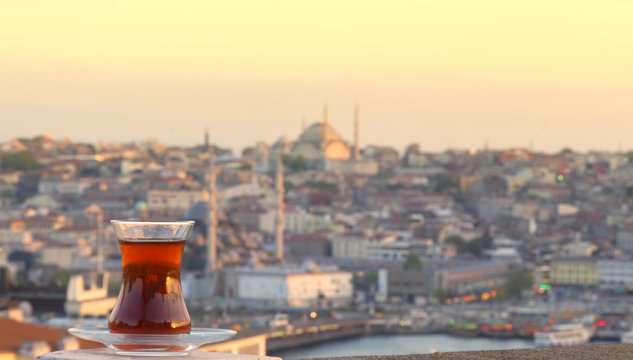 glass of Turkish tea against the background of the center of Istanbul and Bosporus