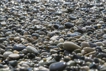 Soft focused blurred picture of a peebles on the beach