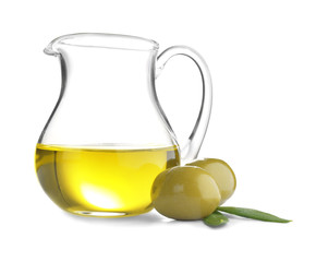 Pitcher with olive oil on white background