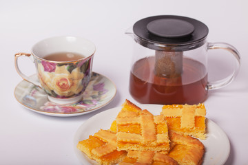 Crostata with apricot jam and a cup of tea.