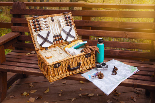 travel map picnic set hot drinks in autumn park background copy space