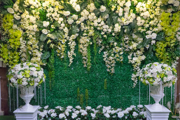 Beautiful artificial flowers arrangement for backdrop wedding ceremony or wedding scene