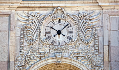 Facade of the Rua Augusta Triumphal Arch with its clock face