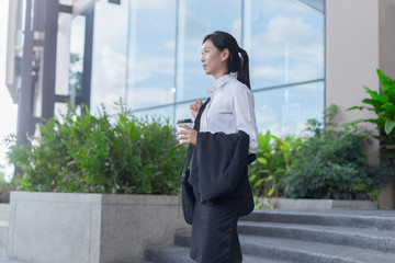 modern business woman working with laptop outdoor