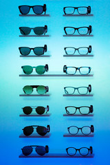Optical store, eyeglasses on blue background