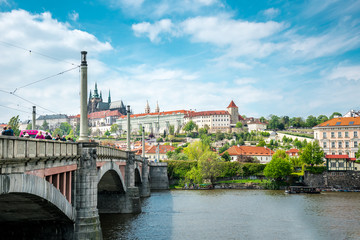Fototapeta na wymiar Transitional bridge across the Vltava River. Tourist attractions in Prague