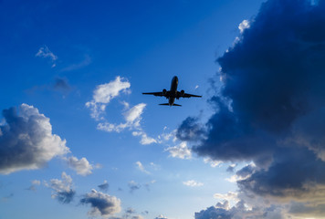 Fototapeta na wymiar Cumulus Cloud and Airplane