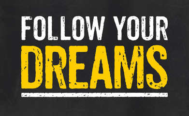 Blackboard with the text Follow your dreams