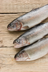 rainbow trout on a wooden board