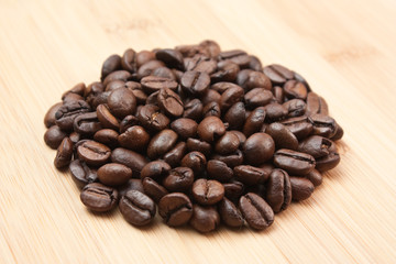 coffee beans on a wooden background