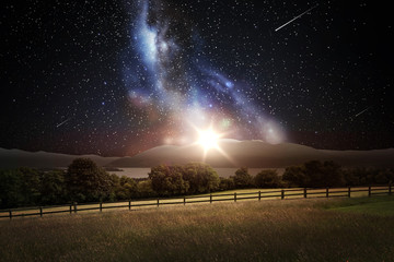 landscape over space and stars in night sky