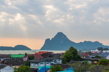 Nature background sunset or Sunrise over the mountains stones and the sea