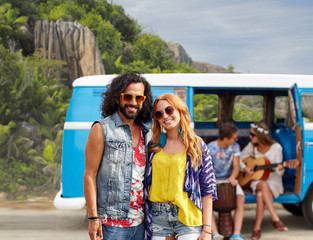 happy hippie couples and minivan on island
