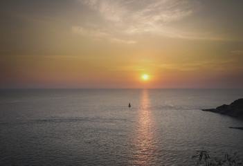 Sailing boat at sunset