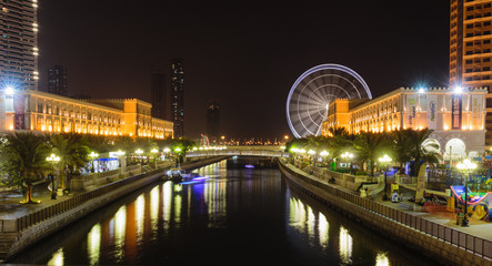 Fototapeta na wymiar Eye of the Emirates - ferris wheel in Al Qasba in Shajah, UAE
