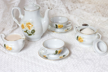 tea set or antique porcelain tea set on white table background