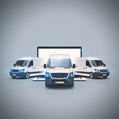 Drei Transporter starten aus einem Notebook Bildschirm zur Auslieferung