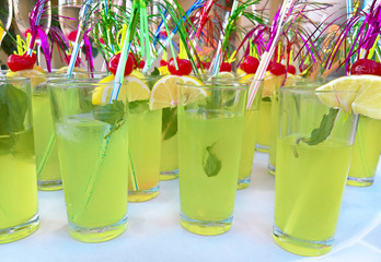 Cocktail drink with the straw lemon and cherry