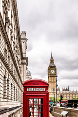 Fototapeta na wymiar London red telephone box with the Big Ben in the background