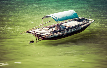 traditonal vietnamese boats and floating village near Cat Ba island, Lan Ha bay, the southestern part of Ha Lng Bay, Vietnam