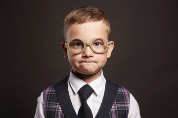funny child in glasses