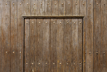 Old wooden door with lock