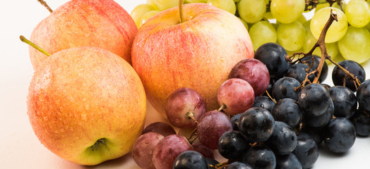 Naklejka na ściany i meble Fruit grapes, apples, on a white background
