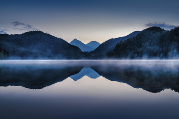 Panele Szklane  Zachód słońca nad jeziorem w górach
