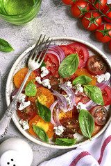 Tomato salad with feta cheese.Top view.