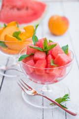 Fresh summer fruit salad with watermelon and peach
