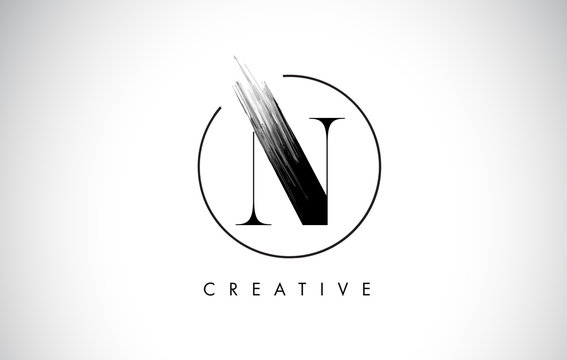 N Brush Stroke Letter Logo Design. Black Paint Logo Leters Icon.