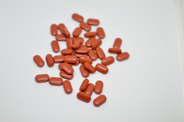 Health vitamins on a daily basis keeping with the concept of medical pill capsule.