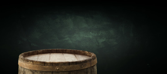 background of barrel and worn old table of wood