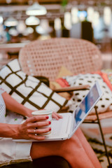 Closeup on sitting woman use laptop for business, creative project, researching study working process. Modern networking communication technology, abstract office indoors background. Content creation