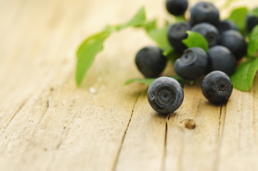 bilberries on a wooden table