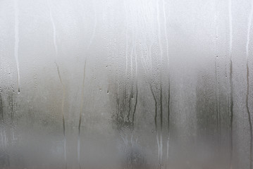 Window with condensate or steam after heavy rain, large texture or background - 171588125