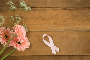 Directly above view of pink Breast Cancer Awareness ribbon by